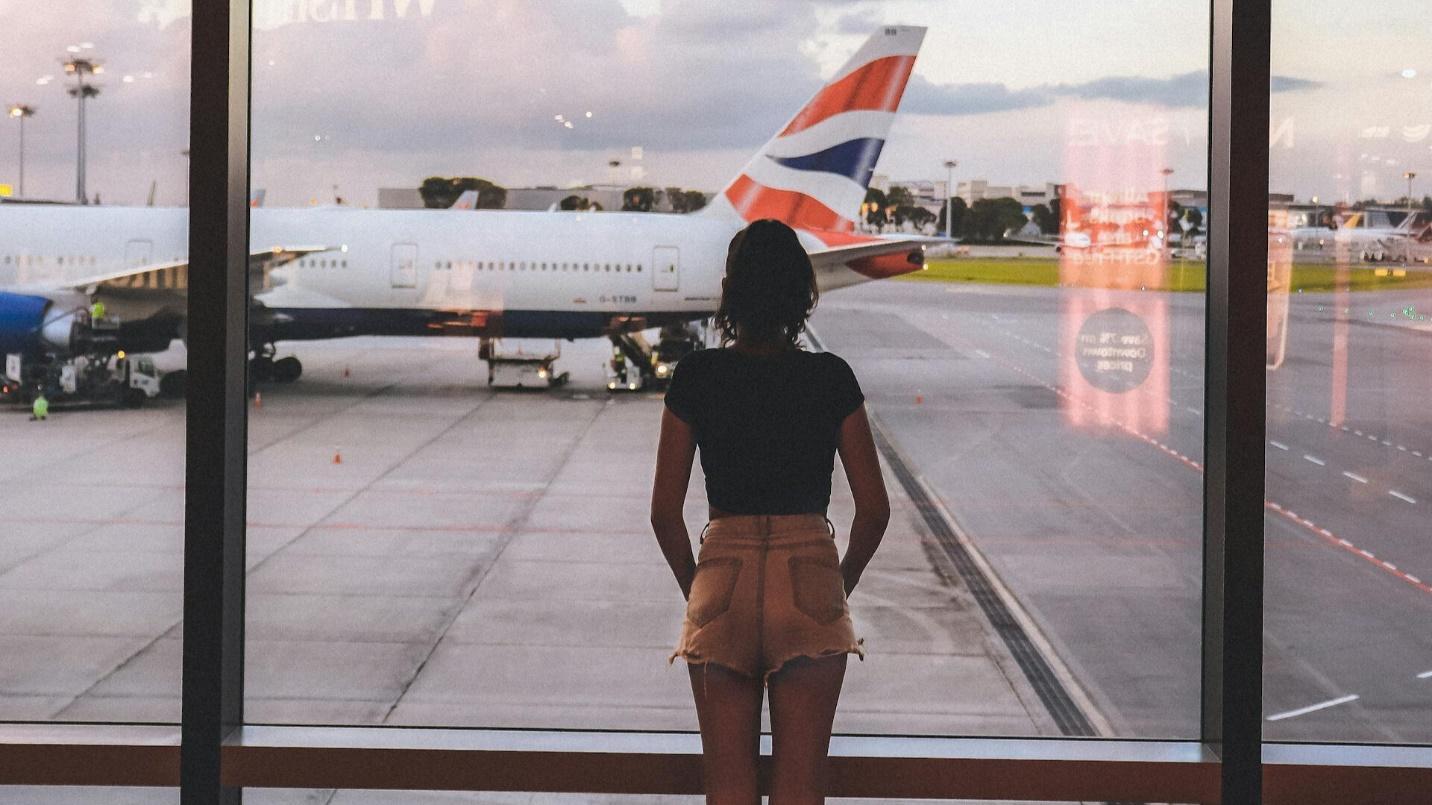 A person viewing outside in an Airport