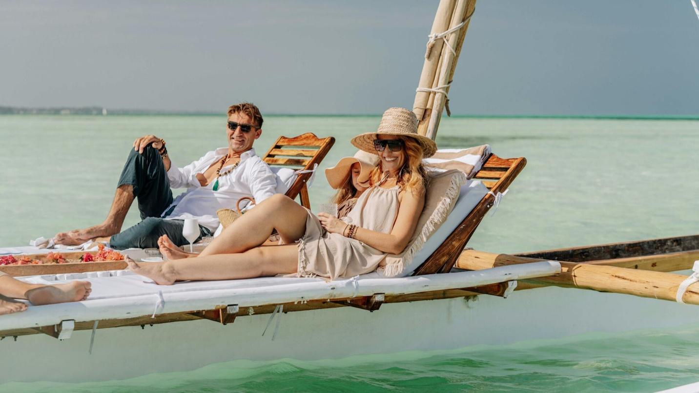 couples enjoying the sun at the beach